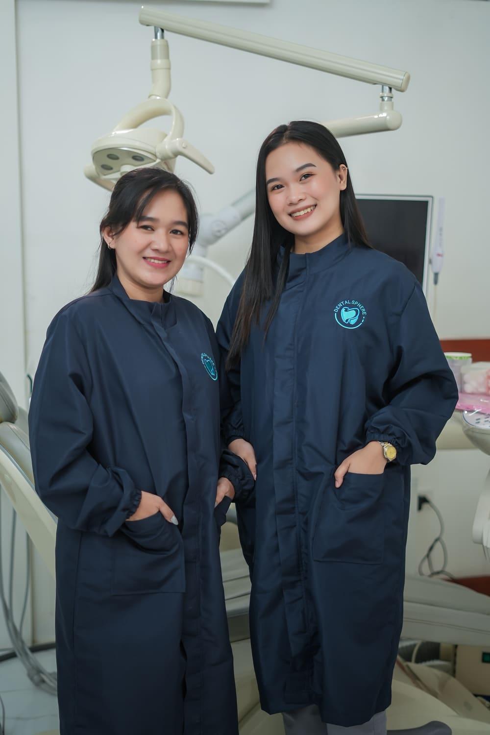 The Dental Sphere dental assistants smiling at the clinic